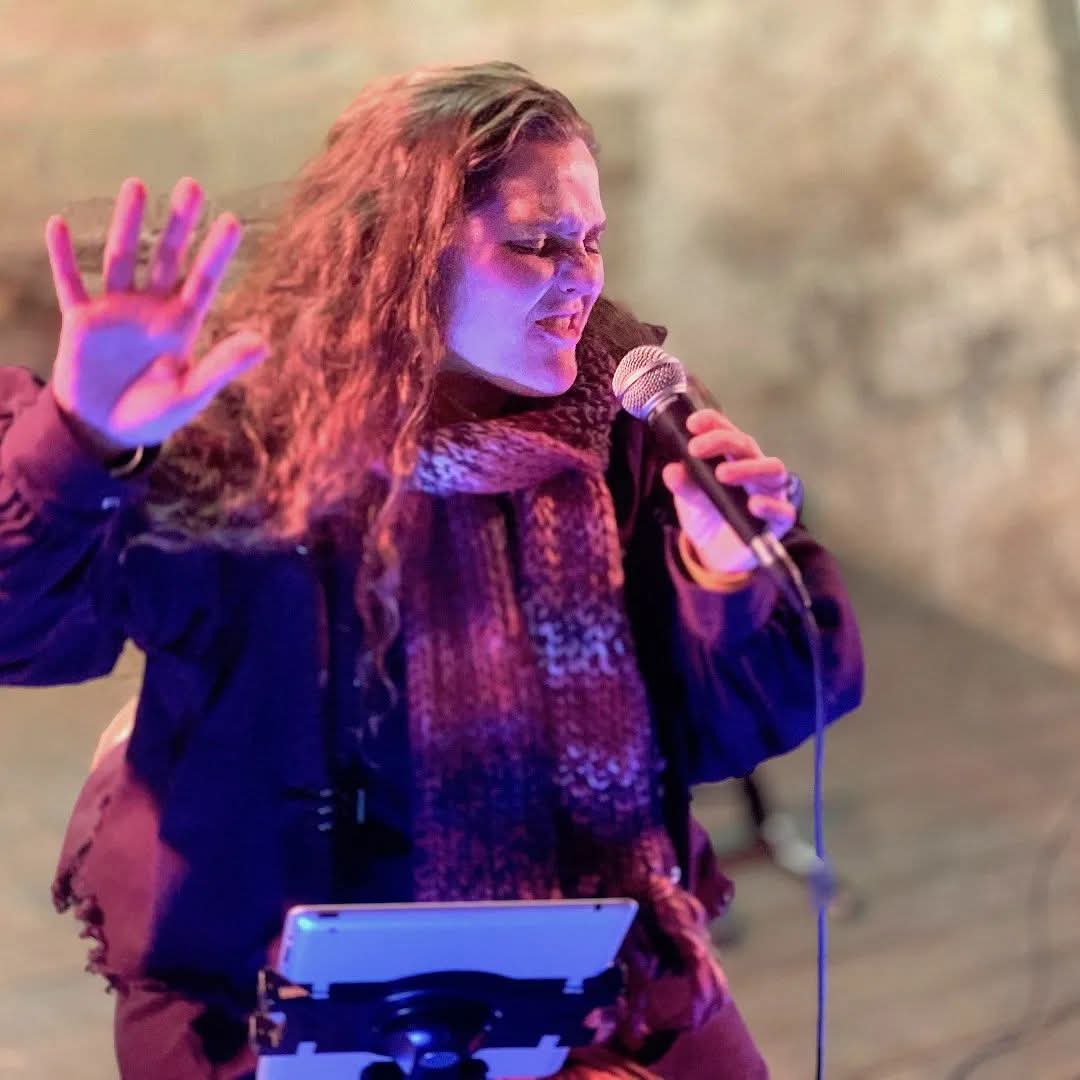 Carmella Louise Singing